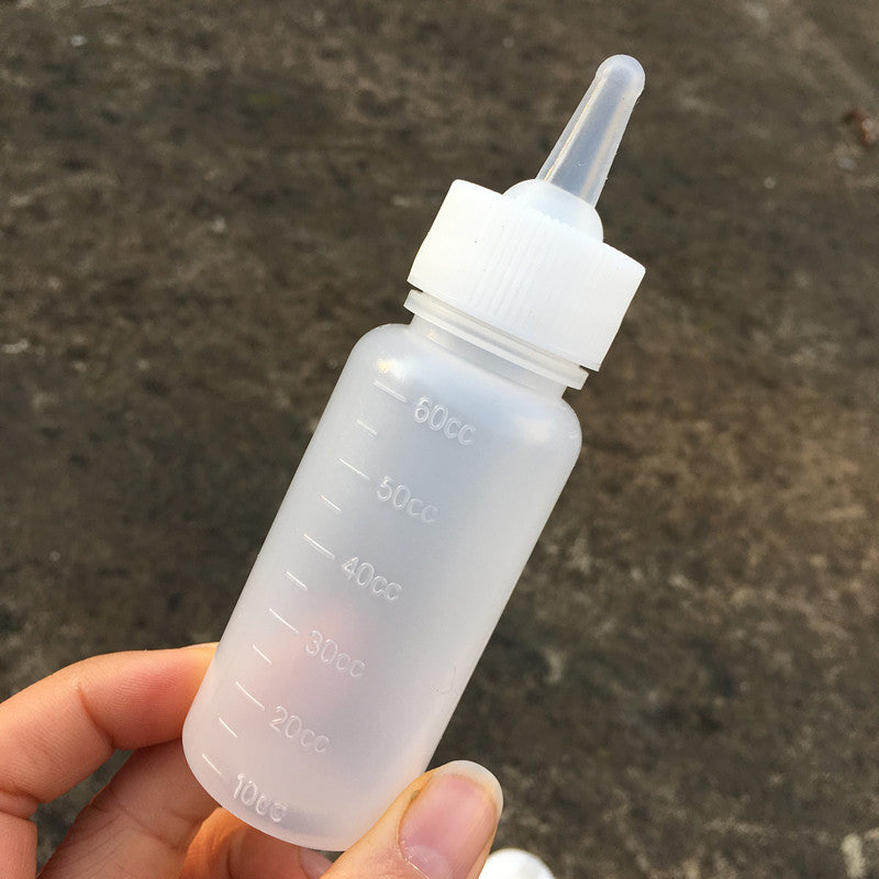 1pc 60ml Pet Milk Feeding Bottle - Soft, Small Nipples for Easy Feeding, Measurement Scale for Accurate Feeding, Essential Pet Nursing Supplies for Kittens and Small Pets