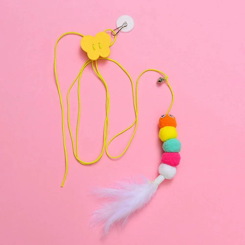 Juguete para gatos con forma de oruga y bola de plumas, juguete para mascotas, cuerda retráctil colgante con sonido.